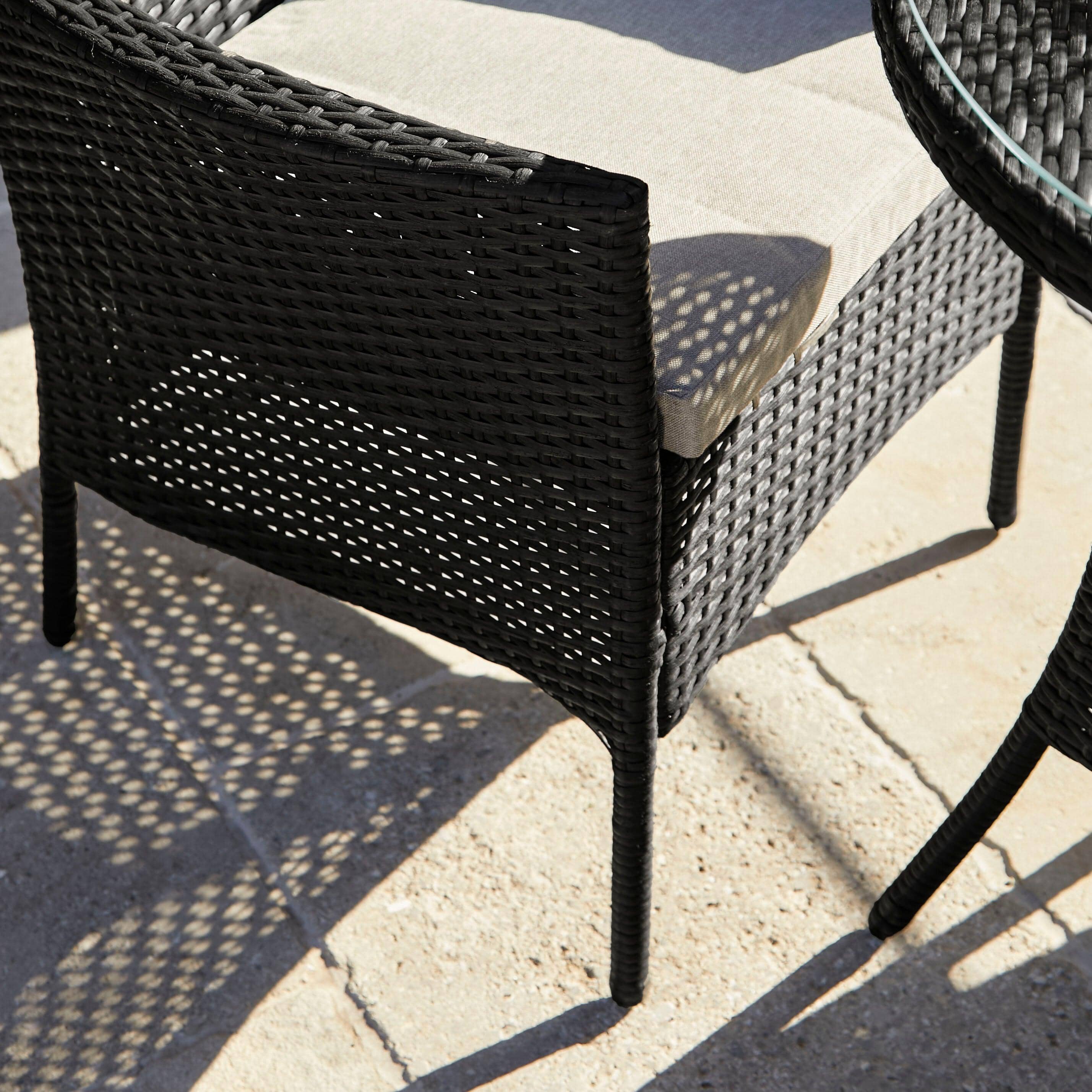 Kemble 4 Seater Rattan Round Garden Dining Table & Chair Set - Black - Image 4