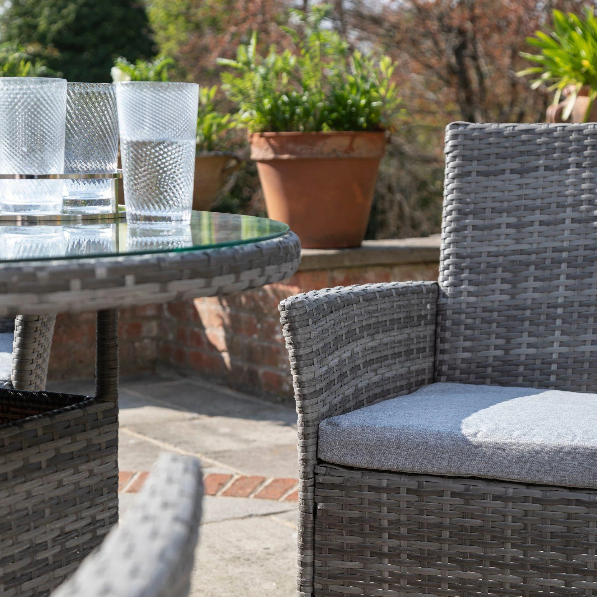 Kemble 4 Seater Rattan Round Dining Set with Grey LED Premium Parasol & Parasol Rain Cover - Grey Weave - Image 8