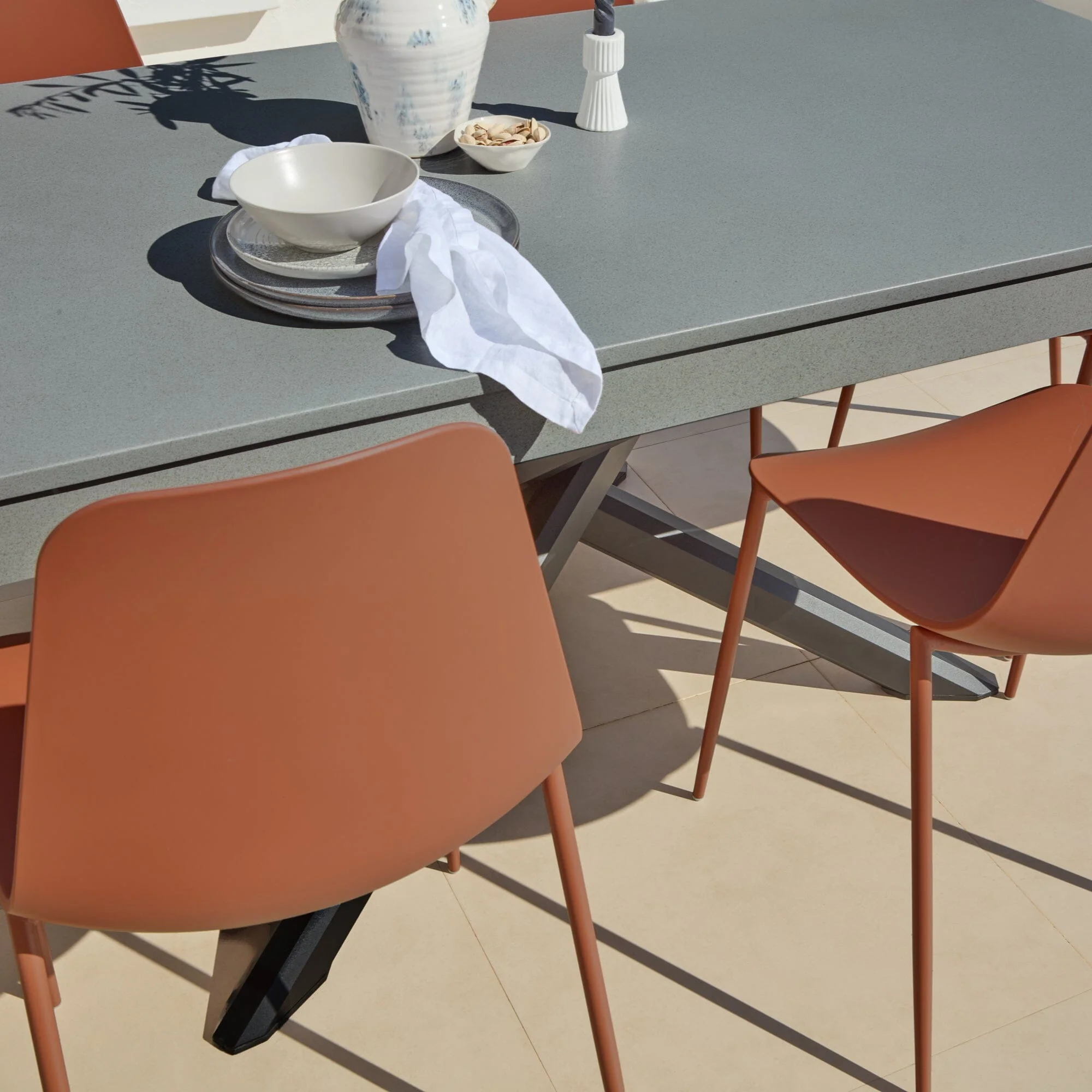 Amelia 6 Seater Dove Grey Concrete Garden Dining Set with Wren Burnt Orange Chairs - Image 8