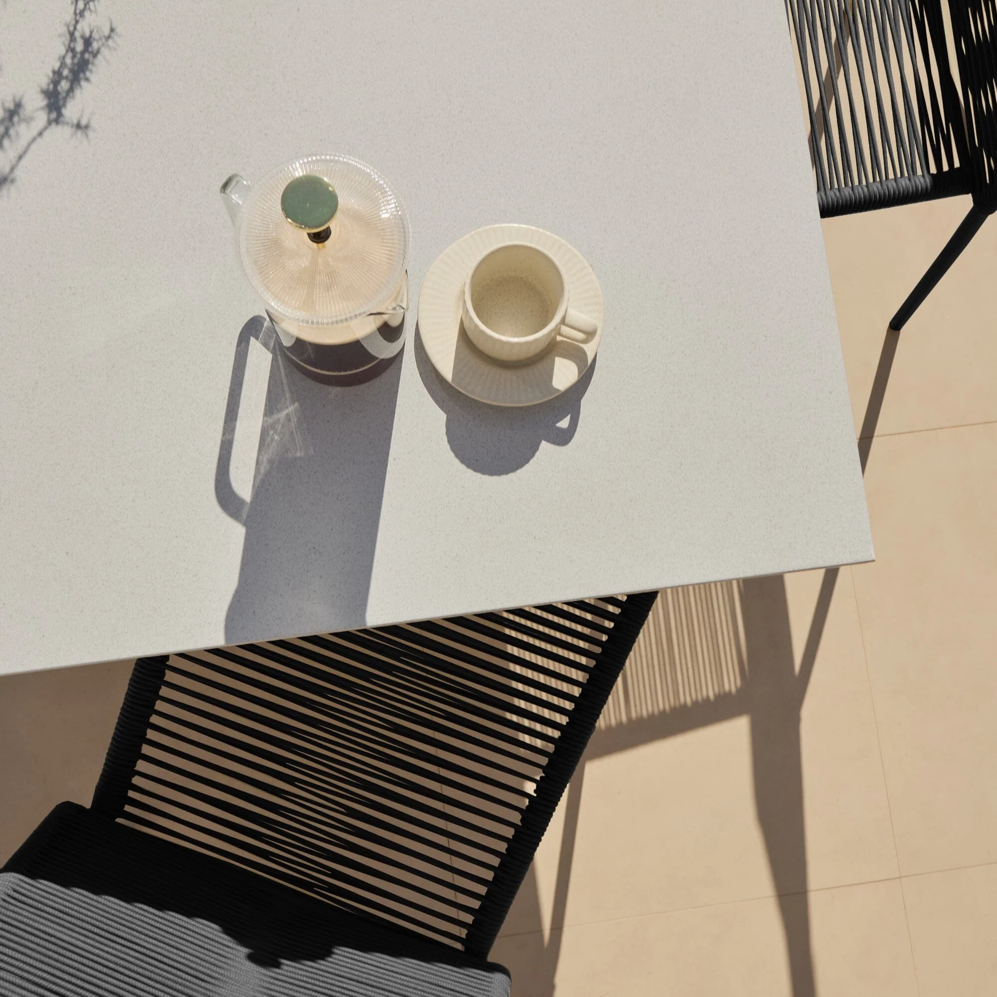 Amelia 6 Seater Pale Grey Concrete Garden Dining Set with Ryder Black Chairs - Image 9
