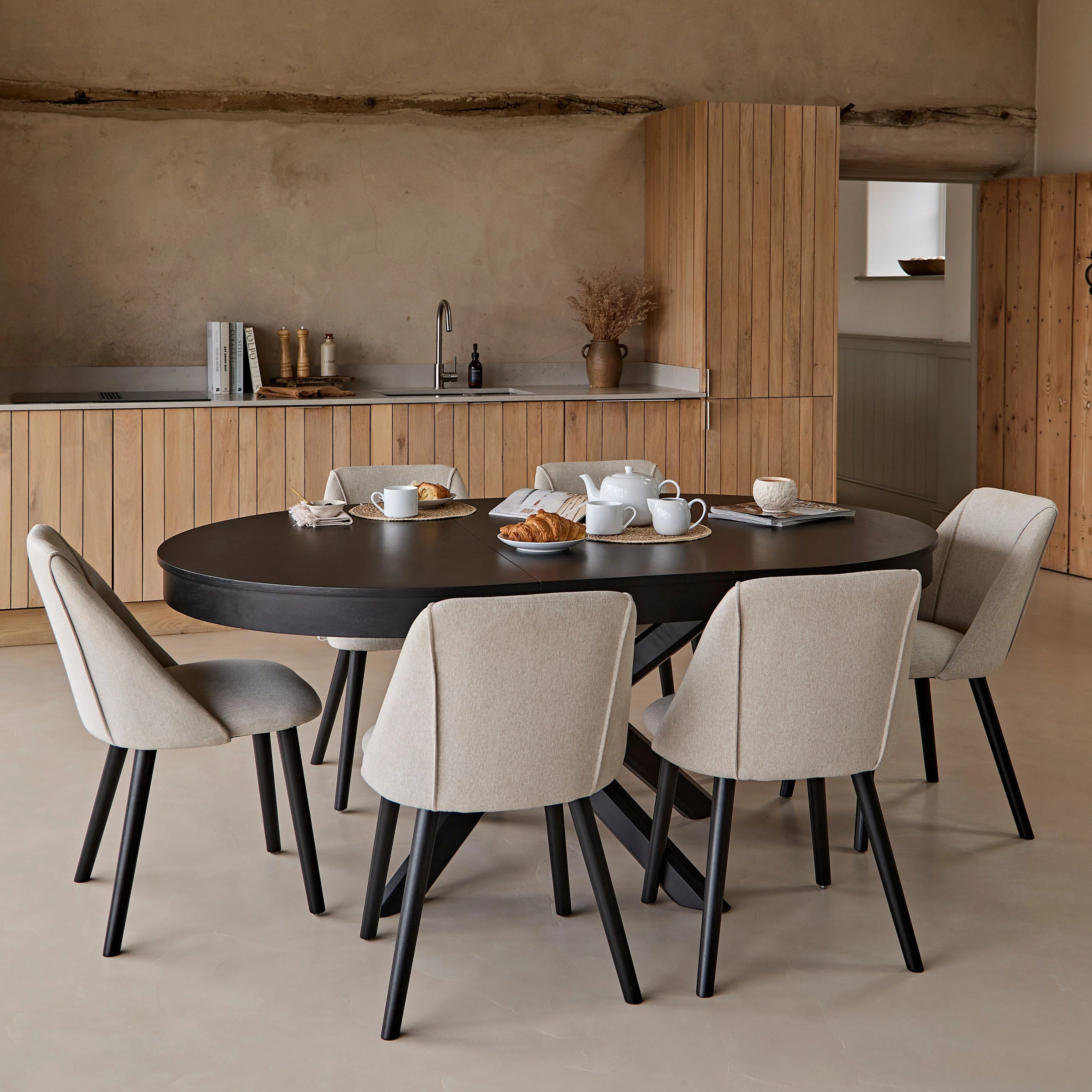 Amelia Black Oak Oval Extending Dining Table Set - 6 Seater - Freya Sand Dining Chairs - Black Oak Legs