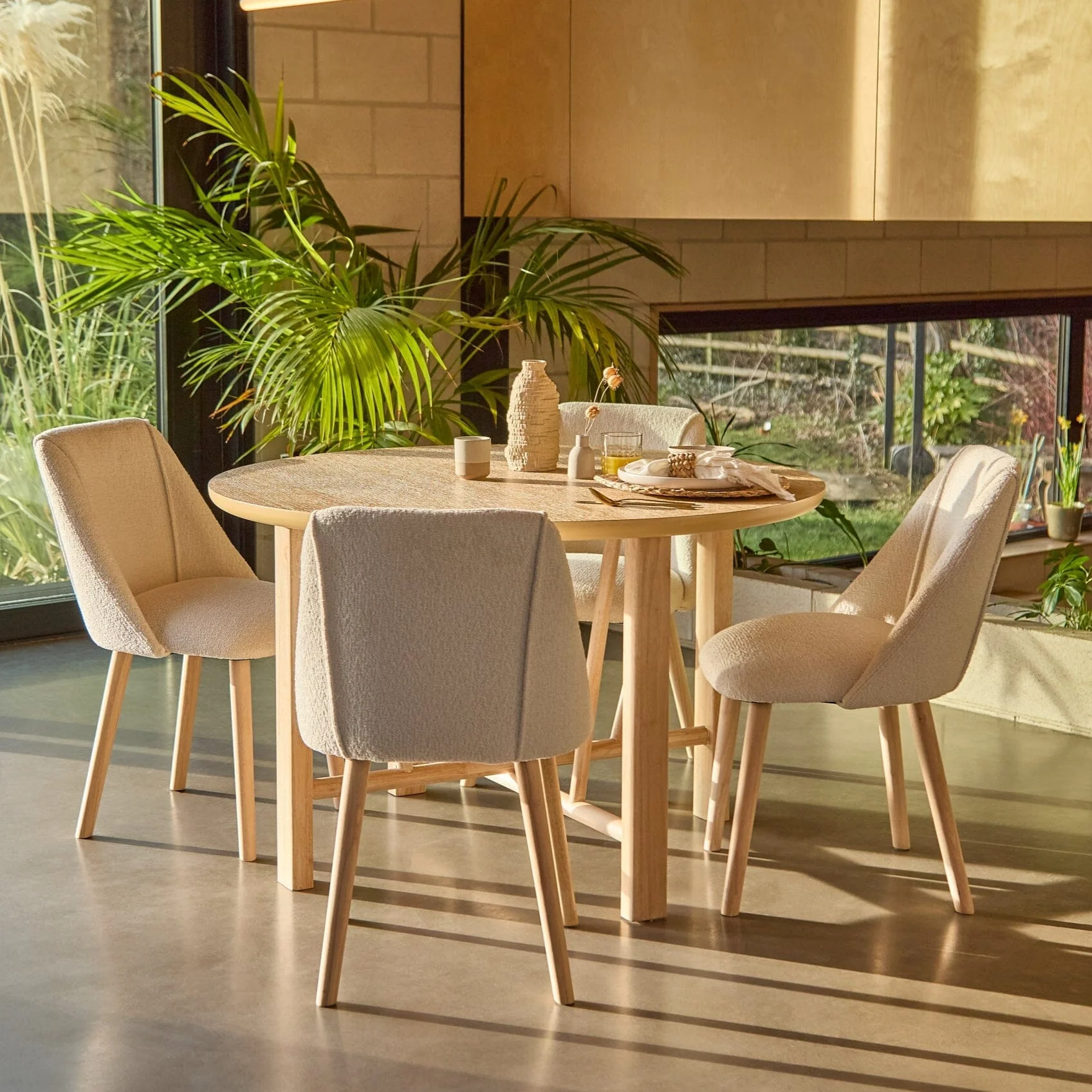 Carter Whitewash Round Dining Table with 4 Freya Boucle Dining Chairs with Whitewash Legs