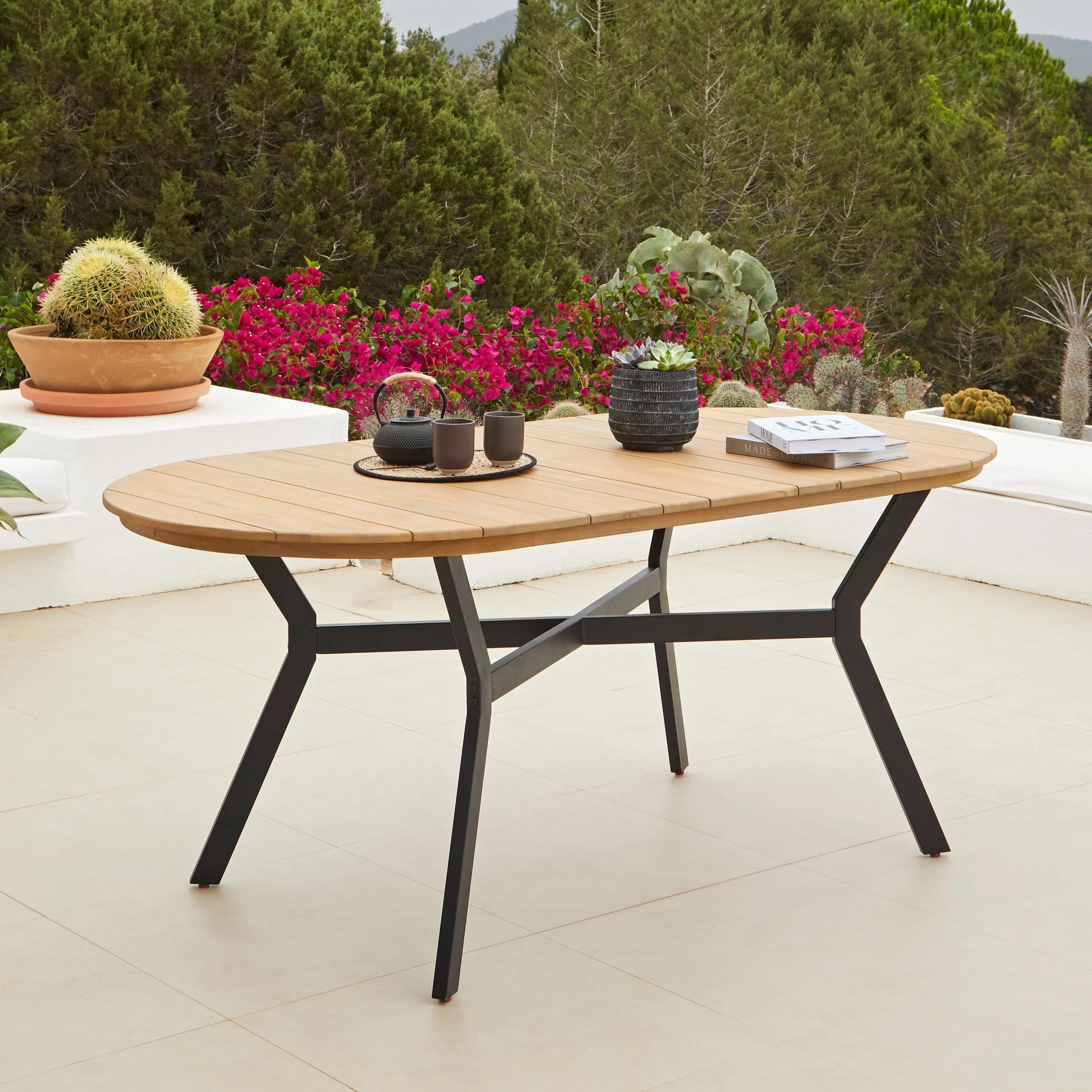Ezra 6 Seater Oval Wooden Garden Dining Set with Ryder Black Chairs - Image 2