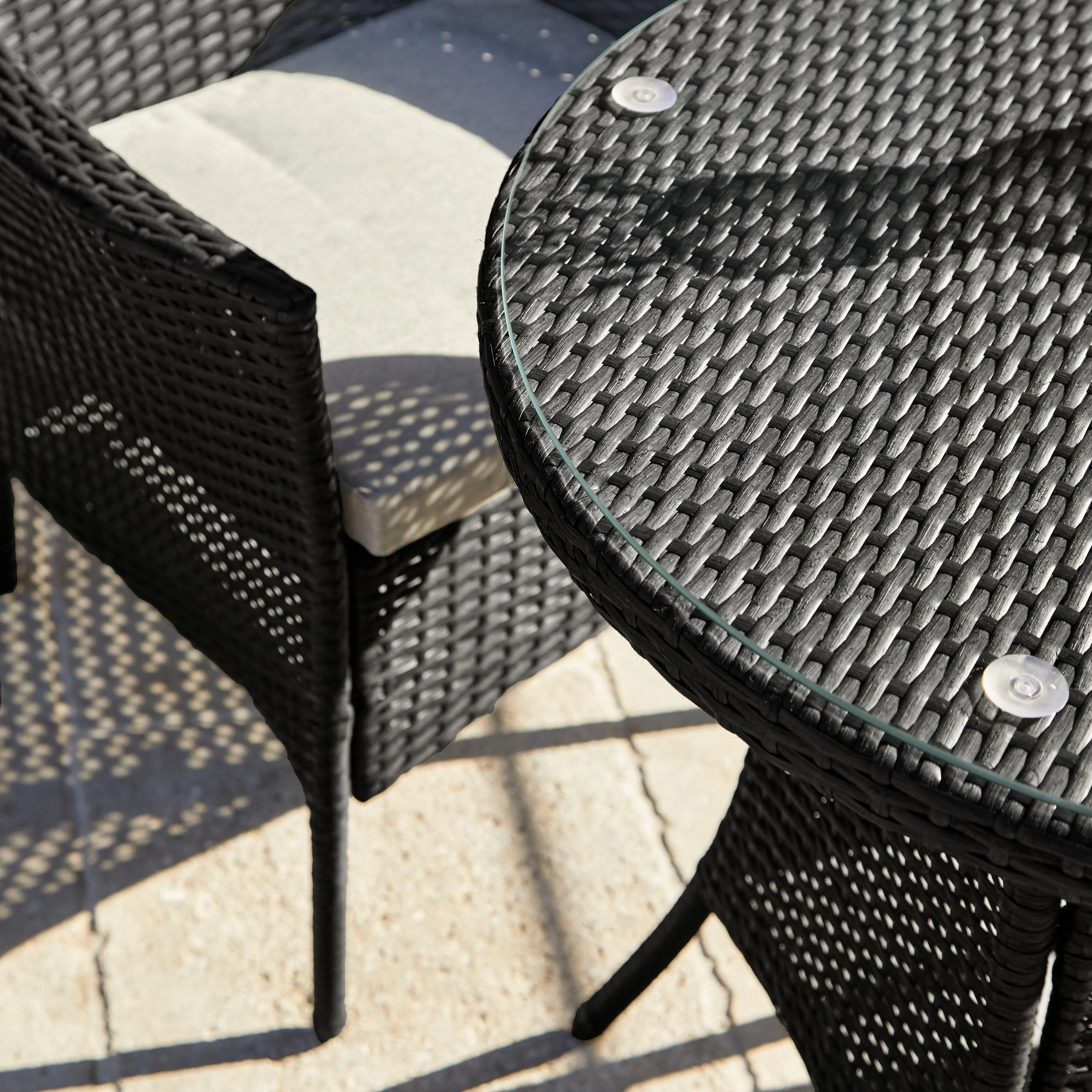 Kemble 4 Seater Rattan Round Garden Dining Table & Chair Set - Black - Image 3